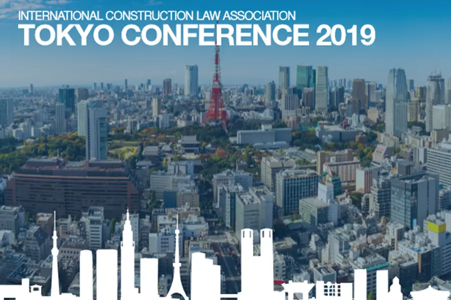 Promotional image for the ICLA Tokyo Conference 2019. It features a panoramic aerial view of Tokyo with the iconic Tokyo Tower in the center and a stylized white skyline silhouette at the bottom. The event is hosted by the International Construction Law Association.