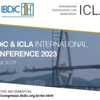 Promotional banner for the IBDiC & ICLA International Conference 2023, showing a large cable-stayed bridge under construction against a hazy mountain backdrop. Conference dates and website are displayed on the layout.