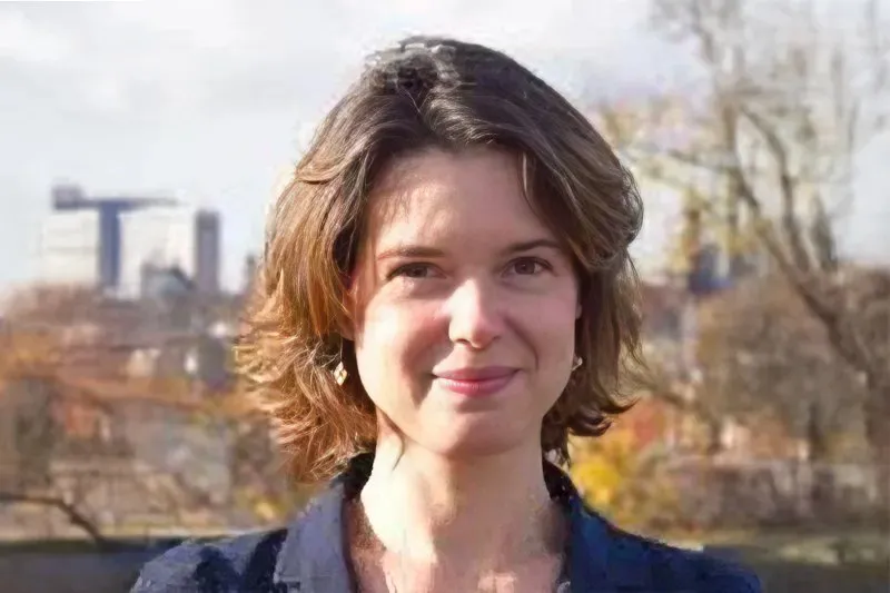 Portrait of Sylvie Cécile Cavaleri Outdoors with Urban Background